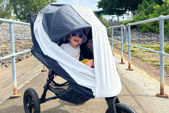 Child in shade protected from the sun using directional shading bub2tot 8in1